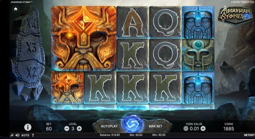 A Colossal fire-god stone symbol filling the left reels of Asgardian Stones