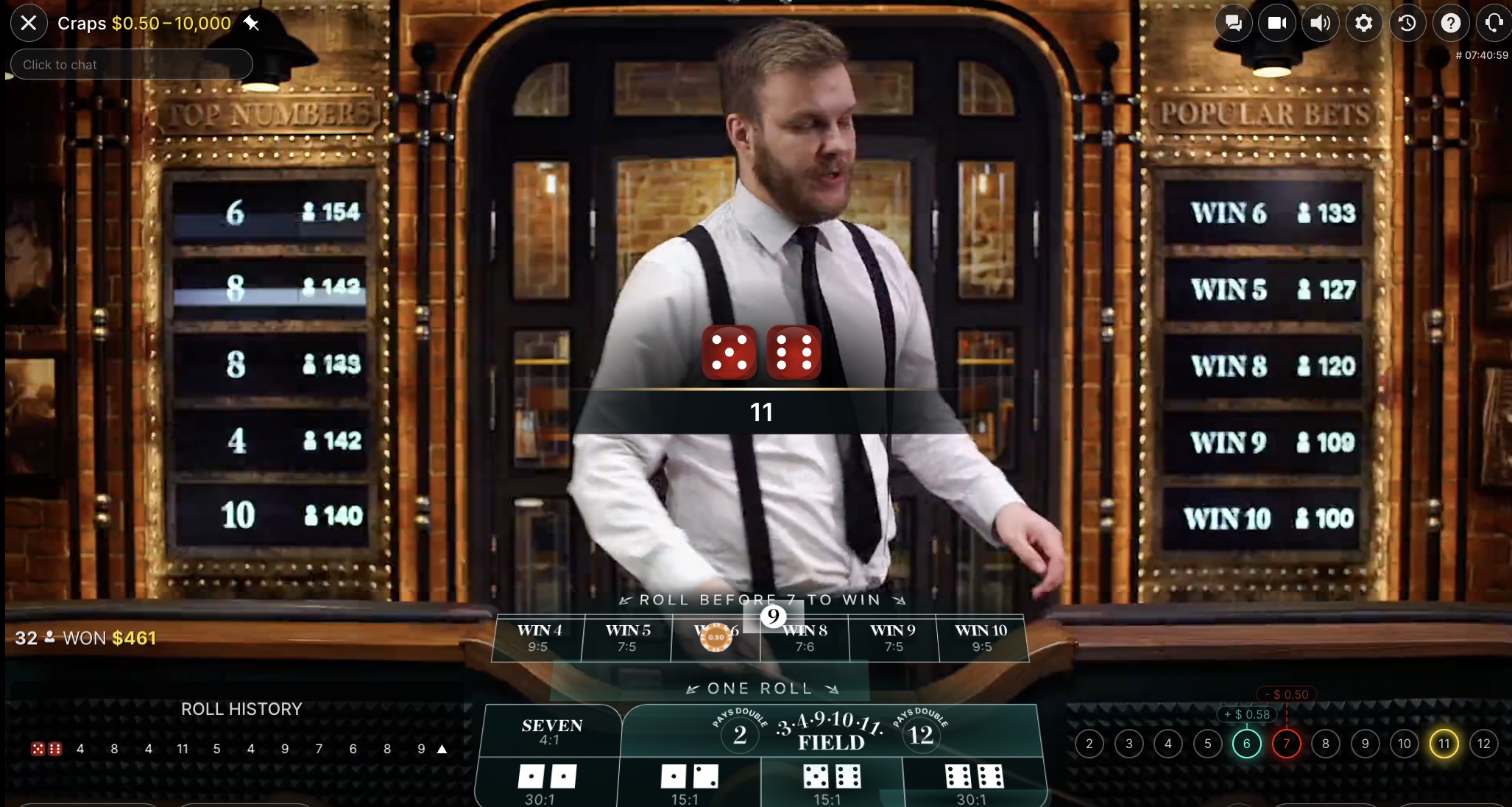 Live dealer craps game showing dice result, point number marker, and available betting options